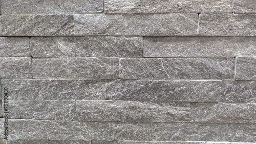 Pattern of stone grey slate wall texture gray background