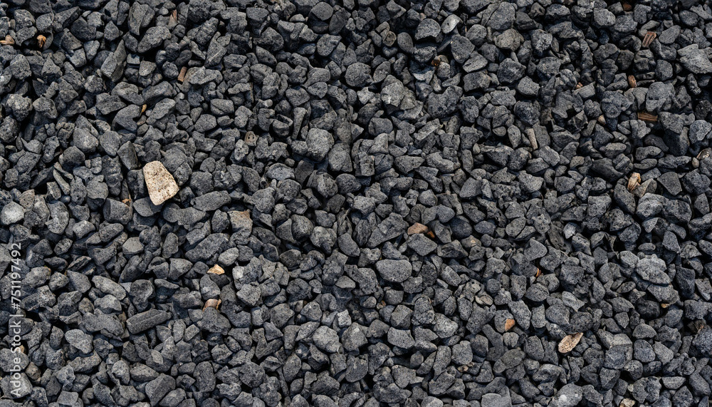 Black gravel. Dark crushed stones background. a little used, it is Black gravel. Dark crushed stones background. a little used, it is