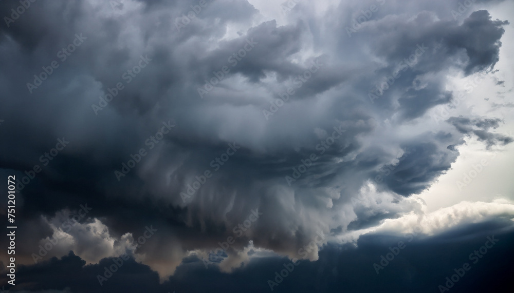 Obraz premium Heavy dark storm raining clouds over the sky