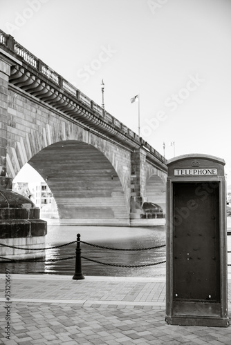 Photography black and white london bridge telephone booth on the river