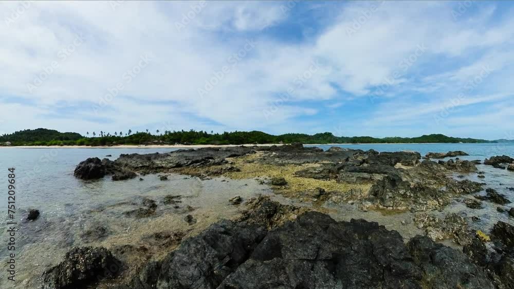 Rocks with ocean waves in coastal area in Santa Fe, Tablas Island. Romblon, Philippines. Rocks with ocean waves in coastal area in Santa Fe, Tablas Island. Romblon, Philippines.