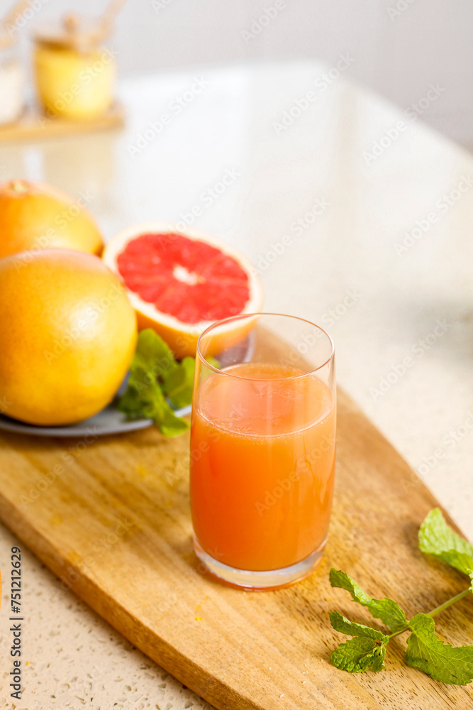 Fototapeta premium Freshly squeezed red grapefruit juice