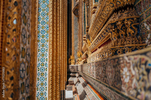 Details of the gilding and tiling on the Grand Palace in Bangkok.