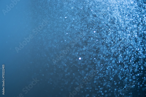 Abstract blue background with bright splashes and light gradient
