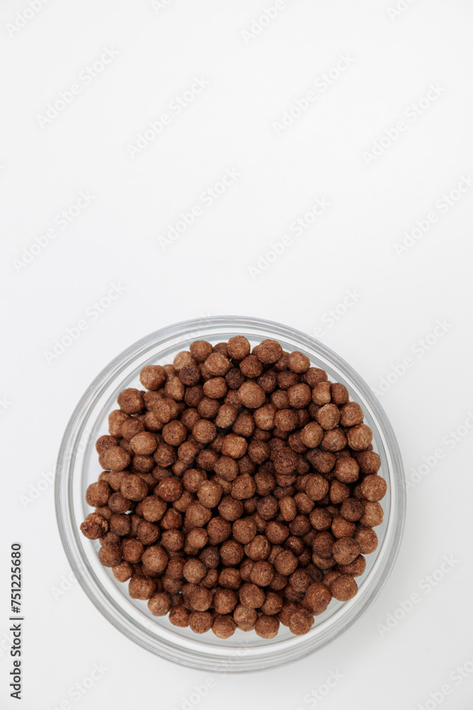 Top view of crunchy chocolate breakfast balls in glass bowl with copyspace Top view of crunchy chocolate breakfast balls in glass bowl with copyspace