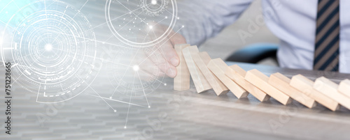 Fotografia Concept of business control by stopping domino effect; panoramic banner