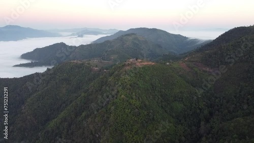 Clouds and sea of ​​mist on the mountains aerial view