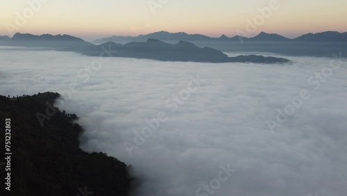 Clouds and sea of ​​mist on the mountains aerial view
