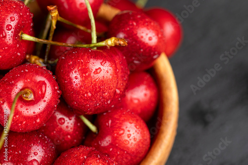 delicious collected and wet cherry berries with pits