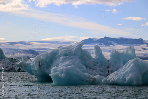 Iceland-Iceberg in Jokulsarlon glacier lagoon with Vatnajökull National Park in the background