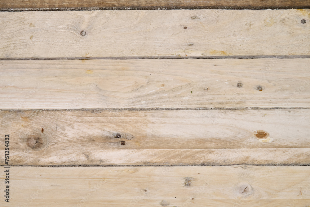 Obraz premium Rough wooden plank on table view from above