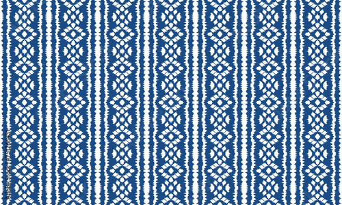 Hand drawn Ikat seamless pattern vector tie dye shibori print with stripes and stripes.