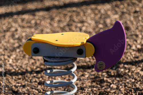 Children's toy, seesaw on a playground with a strong spring