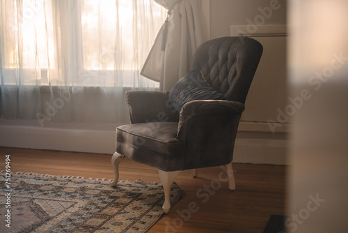 vintage chair by window photo