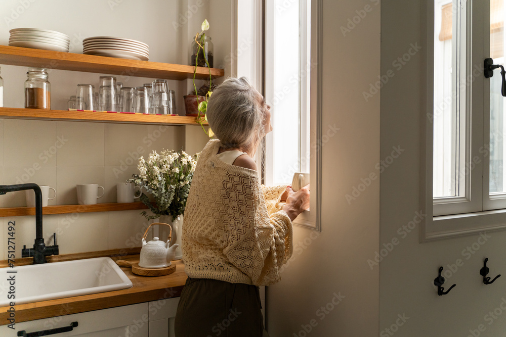 Woman having coffee at home Woman having coffee at home