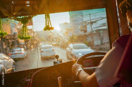 Bus driving trough the traffic in Thailand