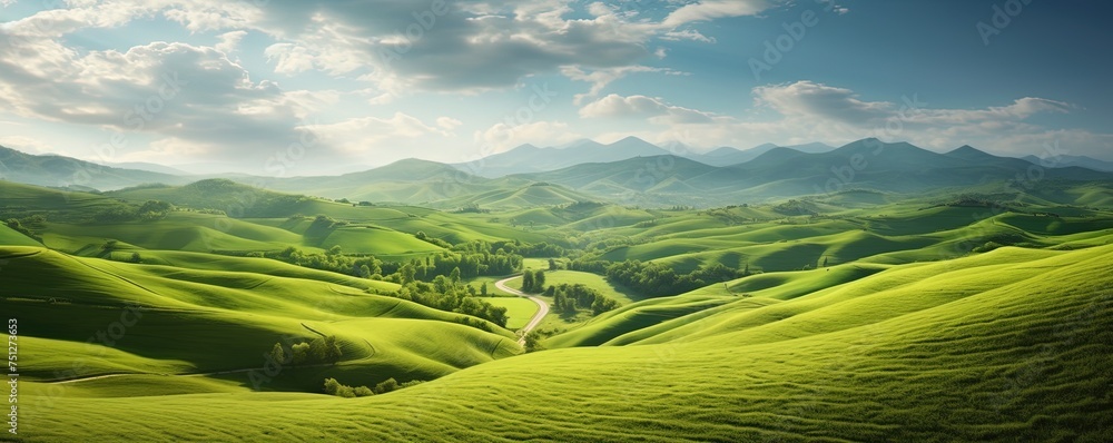 Naklejka premium vast expanse of rolling hills covered in lush green