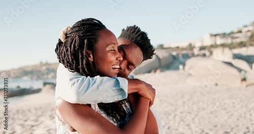 Couple, embrace and happy on beach with love for romance, affection or bonding on honeymoon vacation. Black man, woman and hug by ocean for anniversary date, relax or commitment with joke in Maldives photo