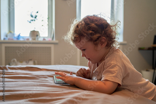 Cute Toddler Using Smartphone At Home
 photo