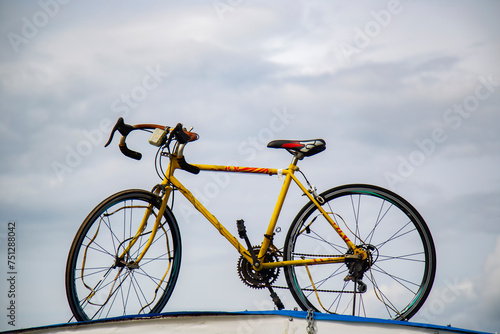 bicycle against cloudy sky background isolated copy space 