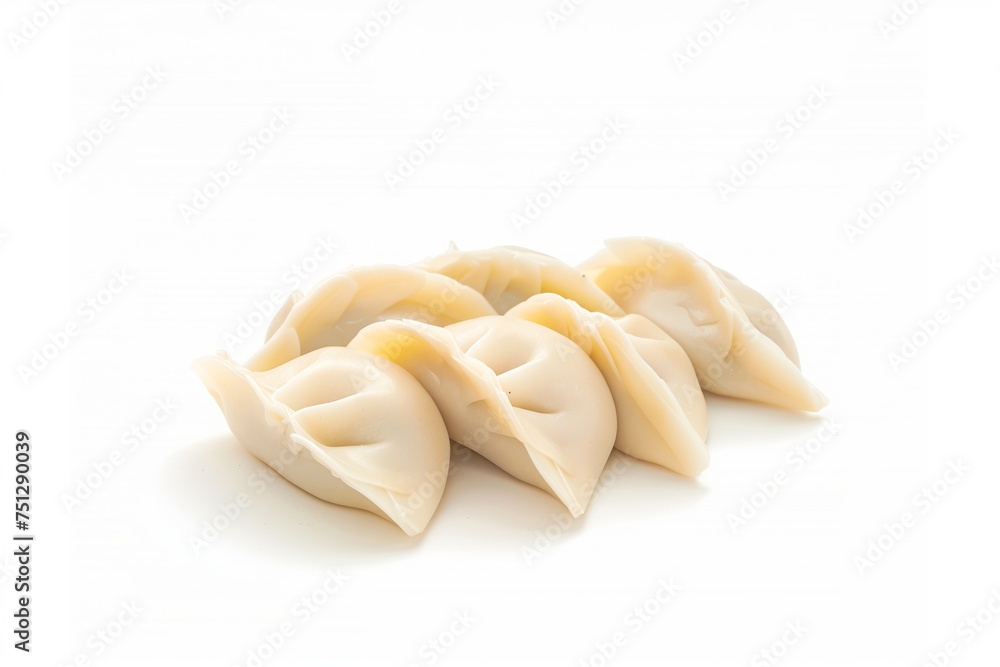 A group of freshly made dumplings isolated on a white background with space for text, perfect for culinary themes and Chinese New Year celebrations A group of freshly made dumplings isolated on a white background with space for text, perfect for culinary themes and Chinese New Year celebrations
