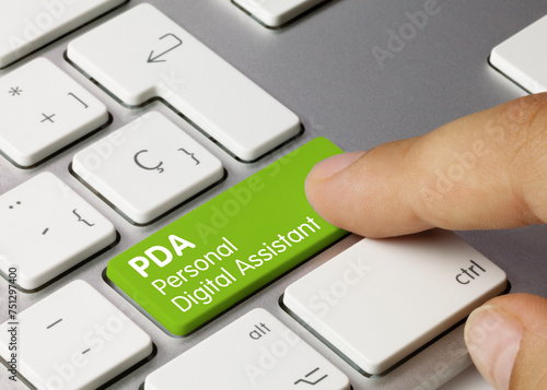 PDA Personal Digital Assistant - Inscription on Green Keyboard Key.