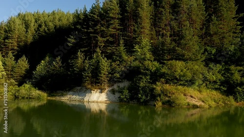 Drone shot aerial view scenic landscape of Big Lake and nature wood and forest.