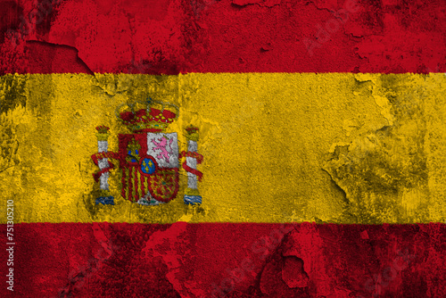 Kingdom of Spain Flag Cracked Concrete Wall Textured Background