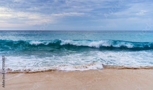 Ocean waves on the beach background © Alex