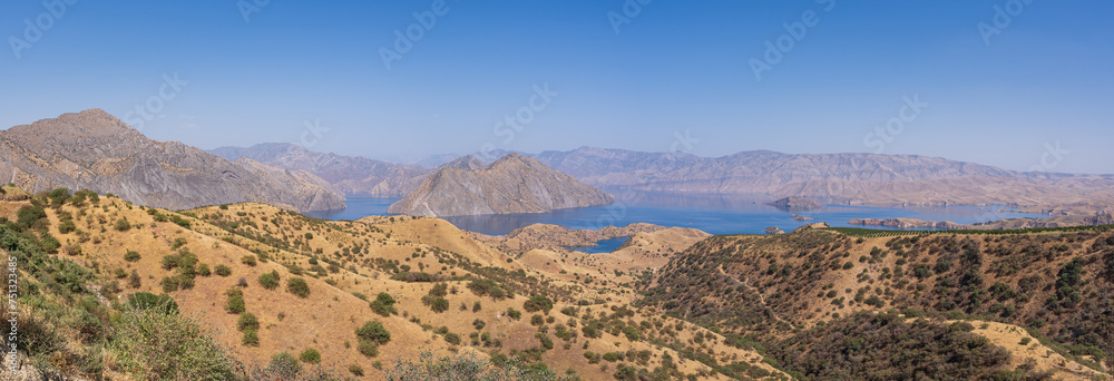 Fototapeta premium Colorful landscape panoramic view of Nurek dam lake second highest in world between Dushanbe and Khatlon, Tajikistan