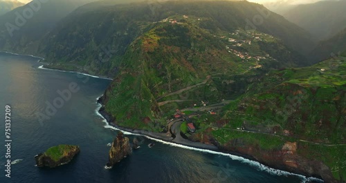 Wallpaper Mural Aerial view big rock in the sea at sunset, Miradouro da Ribeira da Janela. Madeira island, Portugal, Atlantic ocean Torontodigital.ca
