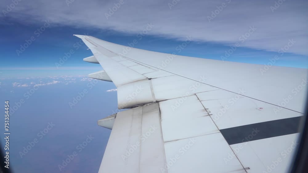 Travelers flying in jet during turbulence. An airplane during flight under severe turbulence. flight hazards Travelers flying in jet during turbulence. An airplane during flight under severe turbulence. flight hazards
