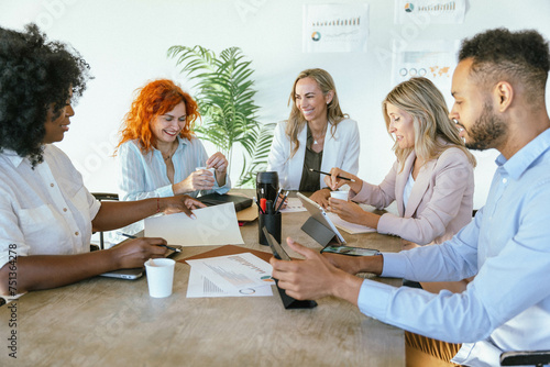 Принти на полотні Diverse business people smiling while having a meeting for planning and strategy discussion