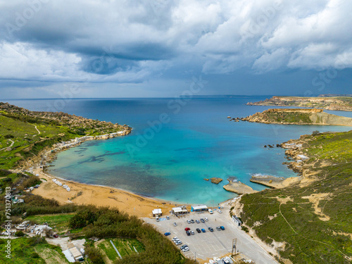 Aerial view of Gnejna Bay and sea, stormy winter sky. Malta country photo