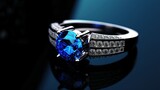 Jewelry ring with blue sapphire on a black background with copy space. Perfect for jewelry store advertisements or engagement-related content with Copy Space.
