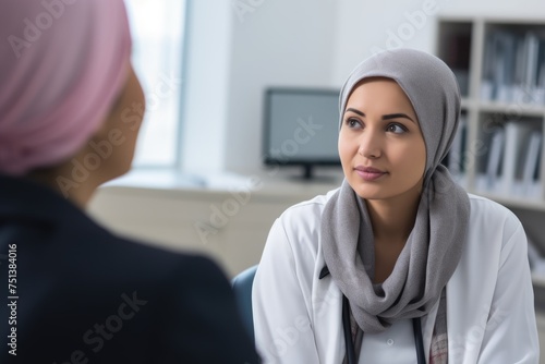 Empathetic Healthcare Professional Consulting with Patient, female patient with a healthcare professional wearing a hijab