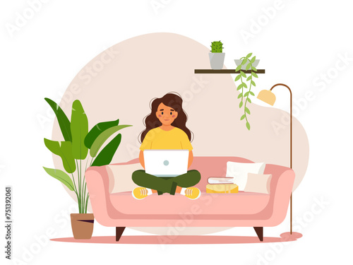 A woman is sitting on the sofa with a laptop. Girl working or learning at home on the sofa. Freelance, work at home, online job, home office e-learning concept. Vector illustration. © Alina