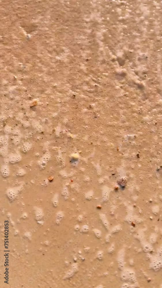Vertical video of sea wave and tidal of sunset peaceful beach in Thailand. Vertical video of sea wave and tidal of sunset peaceful beach in Thailand.