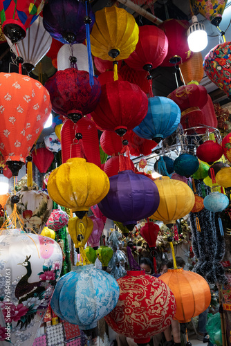 Traditional Vietnamese silk lantern light covers sold at a street market in Hanoi.