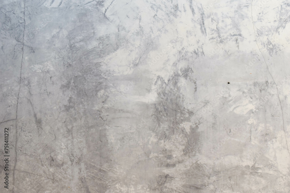 Naklejka premium Grungy grey concrete wall with plaster.
