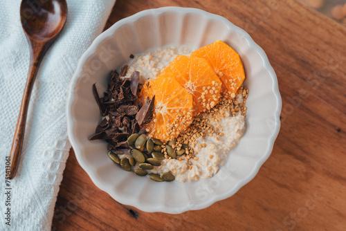 Oatmeal with chocolate orange topping and bee pollen