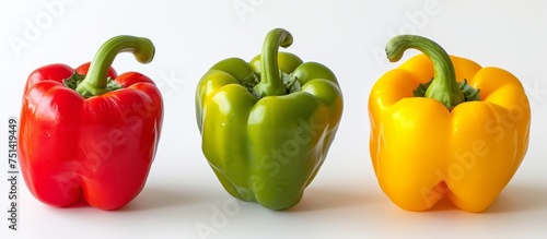 Vibrant Trio: Red, Yellow, and Green Bell Peppers - Fresh and Colorful Vegetables