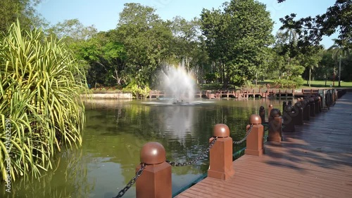 Lake Gardens also known as Kuala Lumpur Perdana Botanical Gardens, it is KL's first large-scale recreational park. People can seen jogging around it.