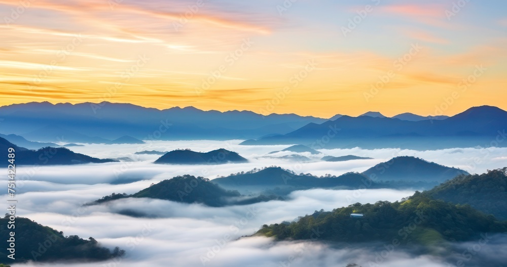 Breaking Dawn Over a Foggy Mountain Valley Landscape