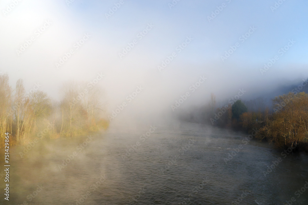 Foggy morning along the Seine river in Champagne-sur-Seine village Foggy morning along the Seine river in Champagne-sur-Seine village