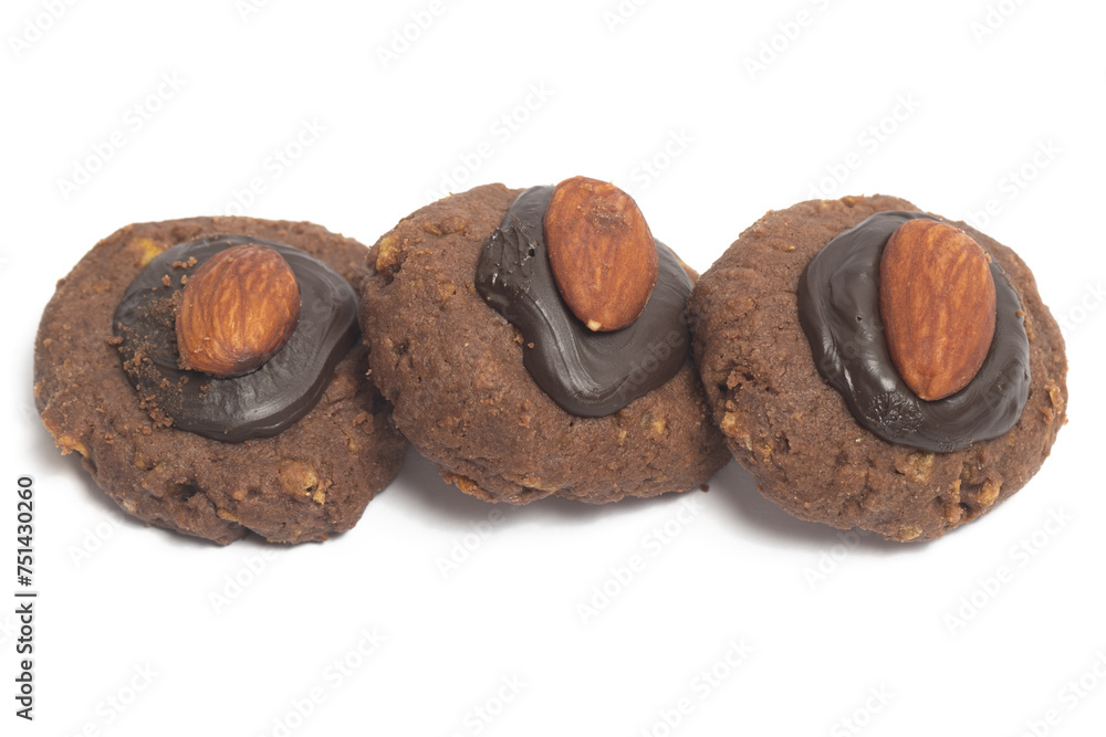 Group of afghan cookies made from chocolate and cornflakes with almond on top isolated on white background clipping path Group of afghan cookies made from chocolate and cornflakes with almond on top isolated on white background clipping path