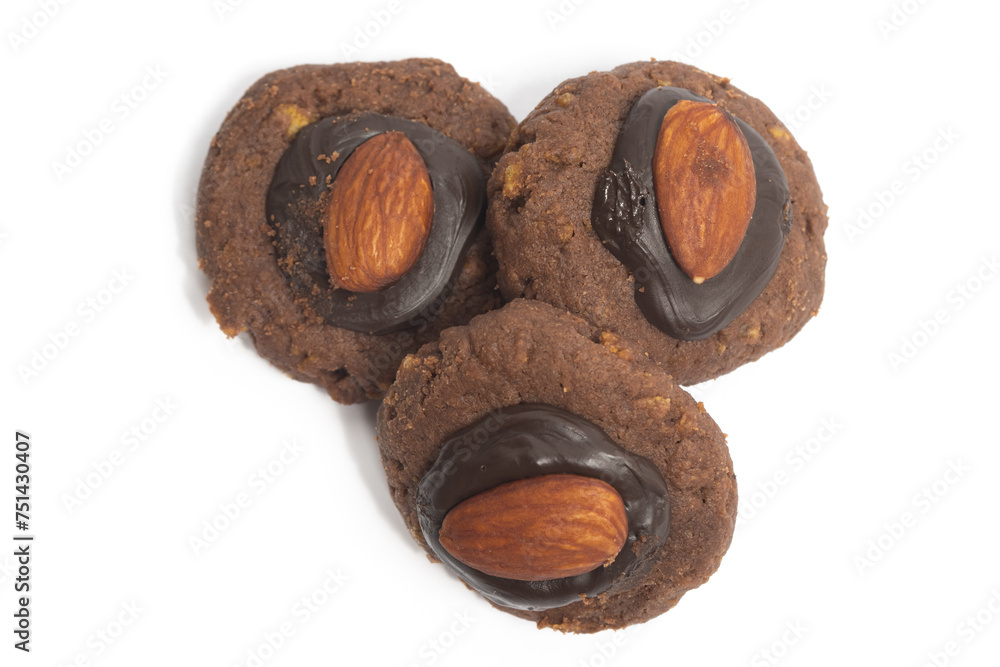 Group of afghan cookies made from chocolate and cornflakes with almond on top isolated on white background clipping path Group of afghan cookies made from chocolate and cornflakes with almond on top isolated on white background clipping path