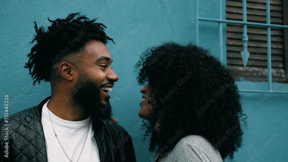 Joyful African American Couple Sharing Laughter in City, Happy Young Black People Enjoying a Moment Outside, authentic real life laugh and smile Joyful African American Couple Sharing Laughter in City, Happy Young Black People Enjoying a Moment Outside, authentic real life laugh and smile