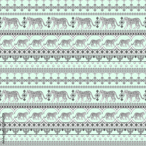 Tiger Leopard animal black outline seamless border pattern with ornate Indian ethnic tribal ornaments folklore on a blue background.