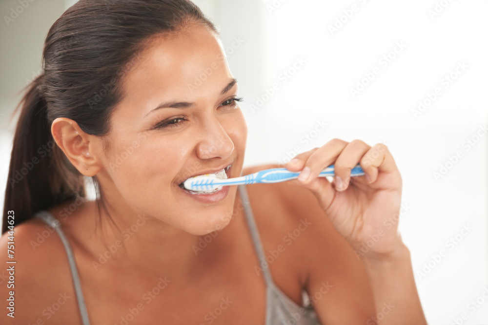 Health, bathroom and woman with toothbrush for cleaning, oral hygiene and dental care in home. Toothpaste, healthcare and person brushing teeth for whitening, wellness and grooming for gum disease Health, bathroom and woman with toothbrush for cleaning, oral hygiene and dental care in home. Toothpaste, healthcare and person brushing teeth for whitening, wellness and grooming for gum disease